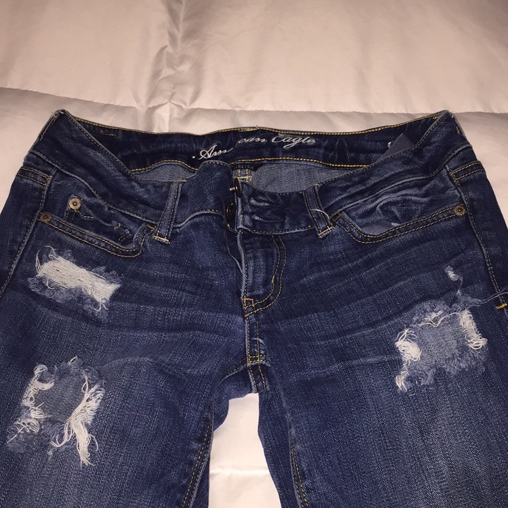 American Eagle dark wash ripped boot cut jeans